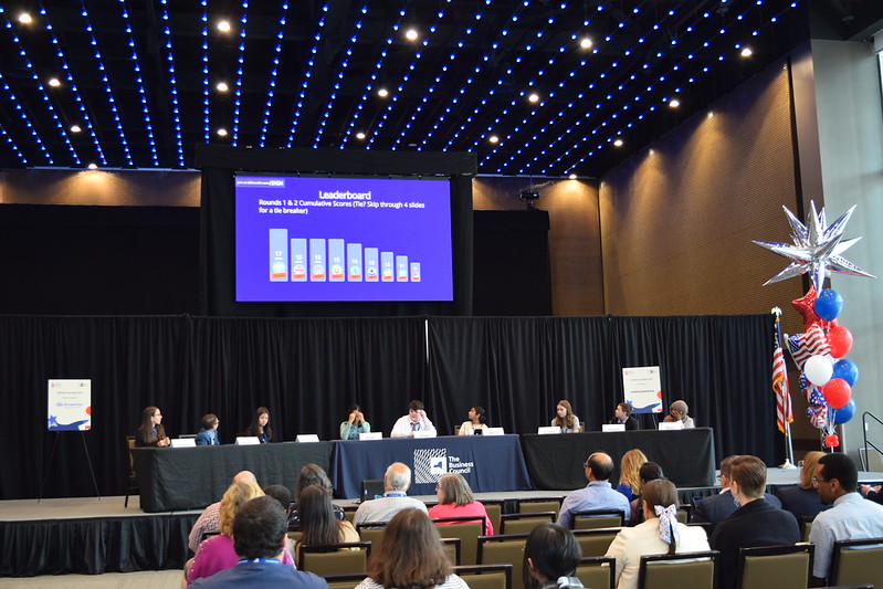 students at the bee compeeting on stage