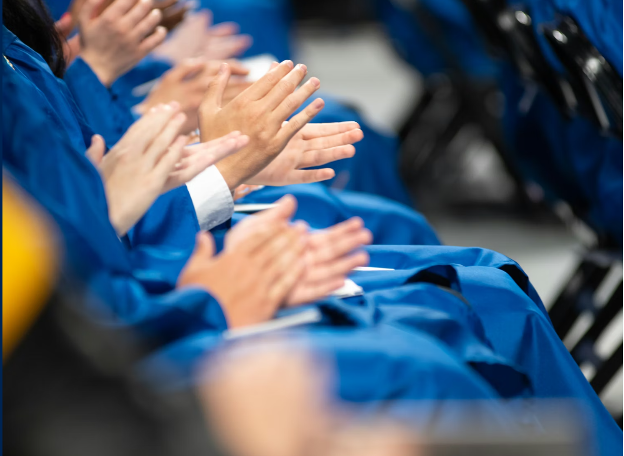 graduates clapping - image by us chamber